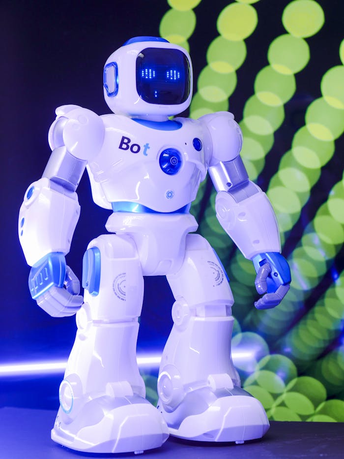 Home High-tech humanoid robot with glowing LED display and futuristic design.